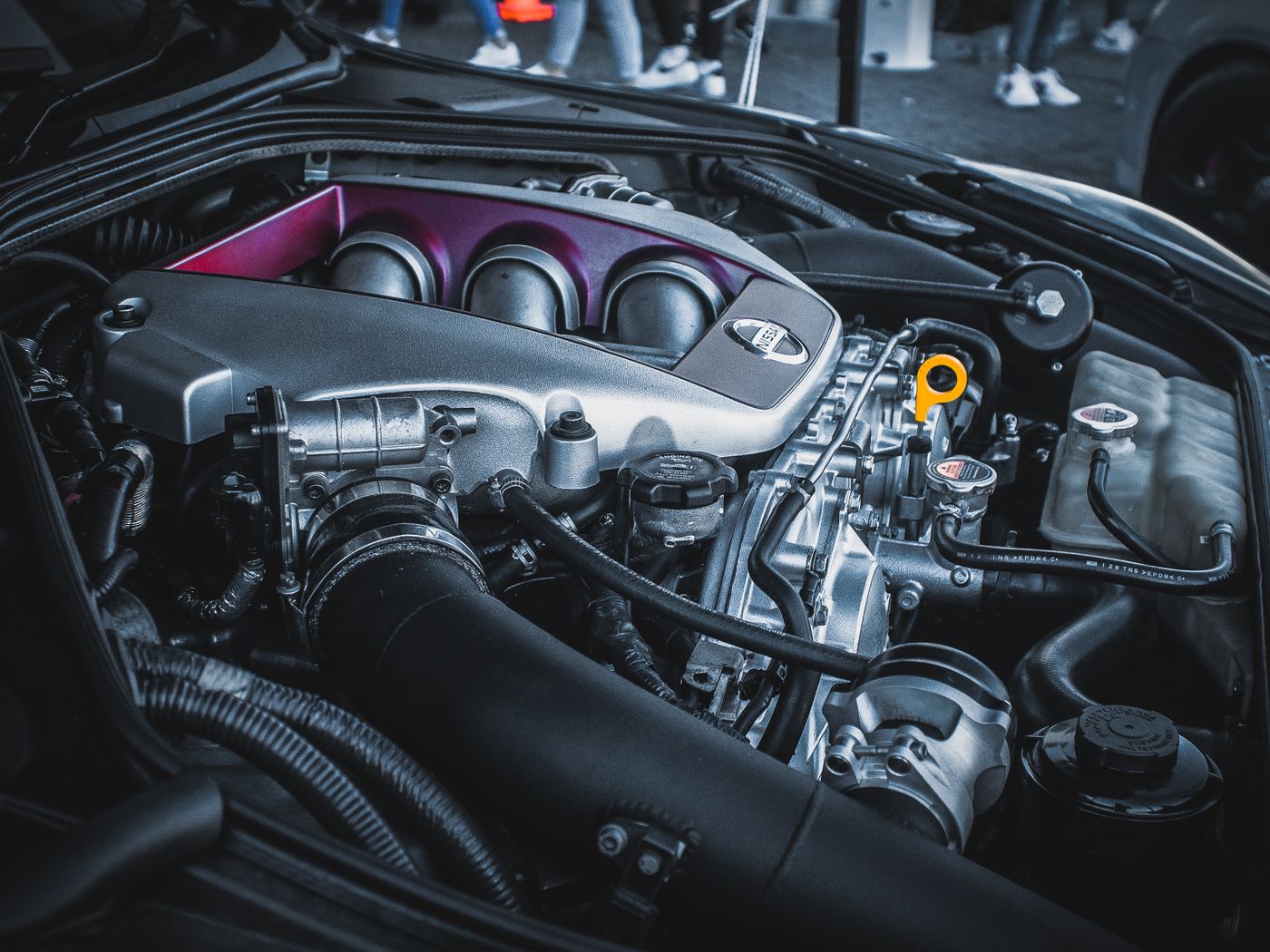 Engine bay with the ECU and wiring exposed